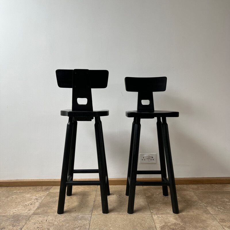 Pair of mid-century brutalist black bar stools, 1970