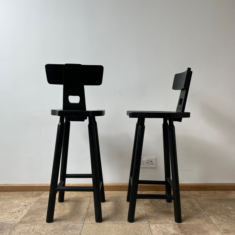 Pair of mid-century brutalist black bar stools, 1970