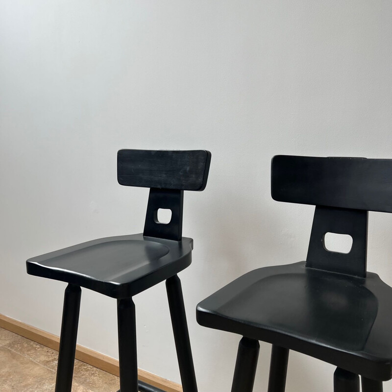 Pair of mid-century brutalist black bar stools, 1970