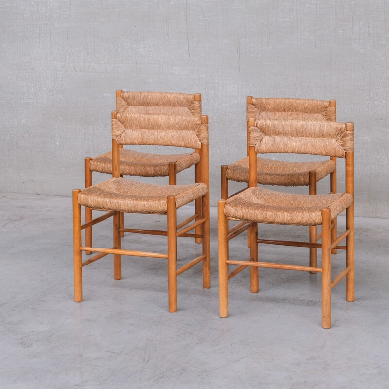Set of 4 mid-century "Dordogne" rush dining chairs by Charlotte Perriand, France 1950s