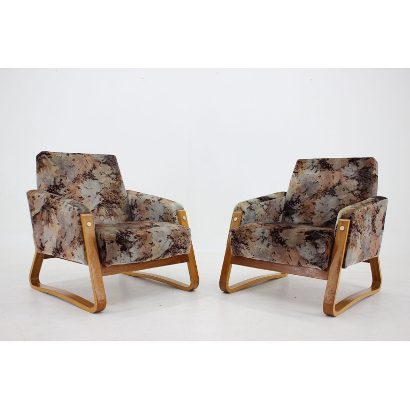 Pair of mid-century armchairs by Ludvik Volak for Drevopodnik Holesov, 1960s