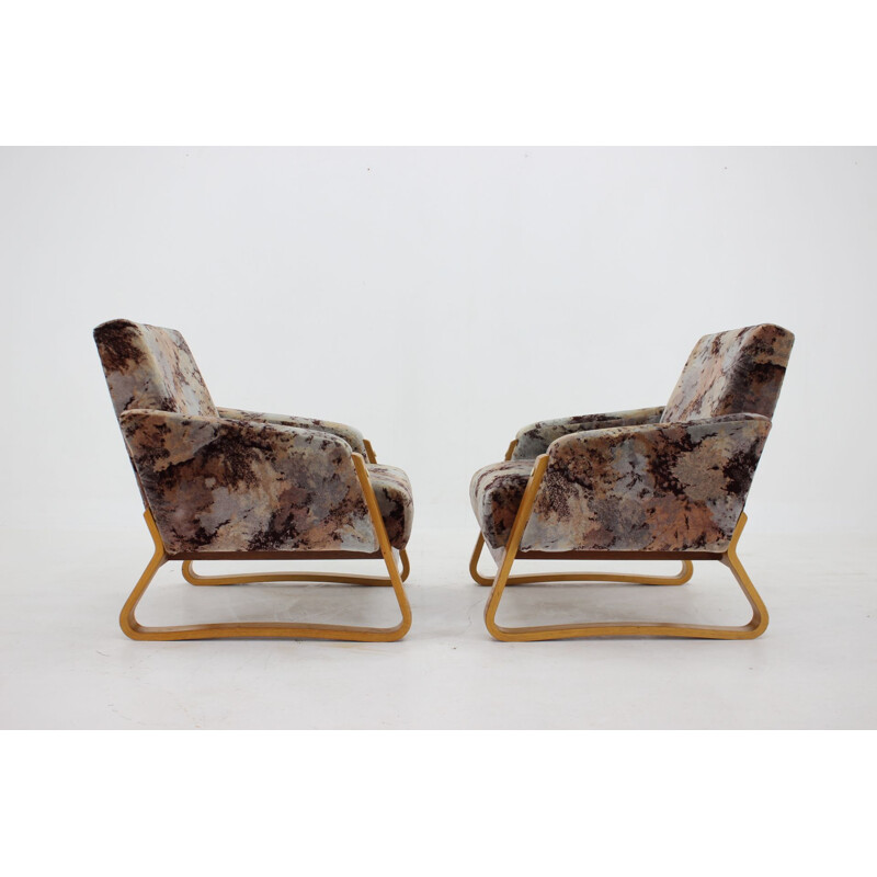 Pair of mid-century armchairs by Ludvik Volak for Drevopodnik Holesov, 1960s