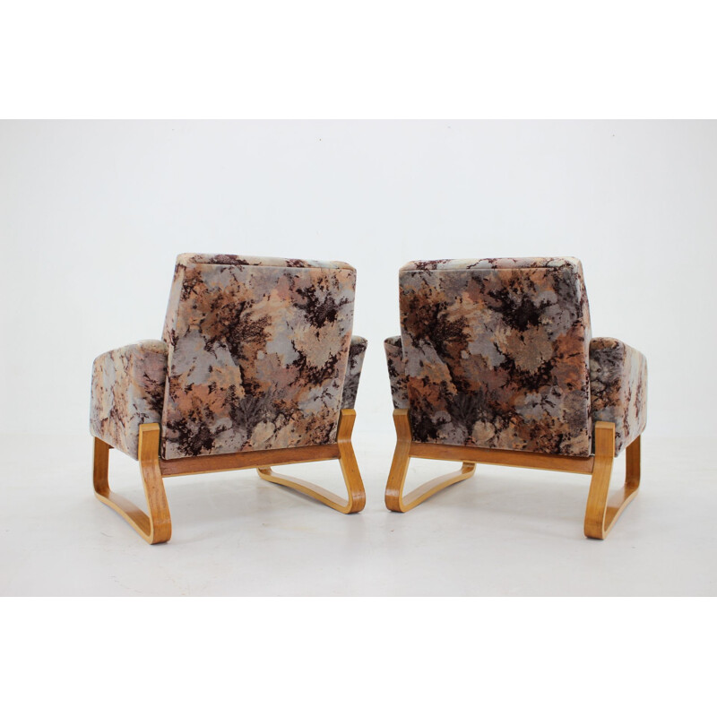 Pair of mid-century armchairs by Ludvik Volak for Drevopodnik Holesov, 1960s
