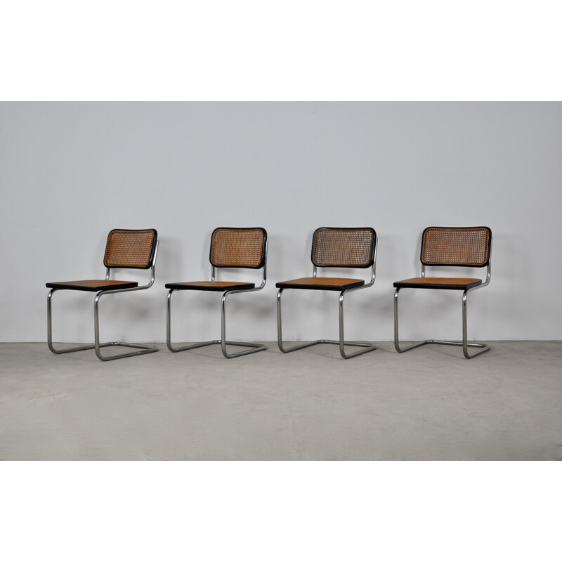 Set of 4 vintage chairs in metal, wood and rattan by Marcel Breuer