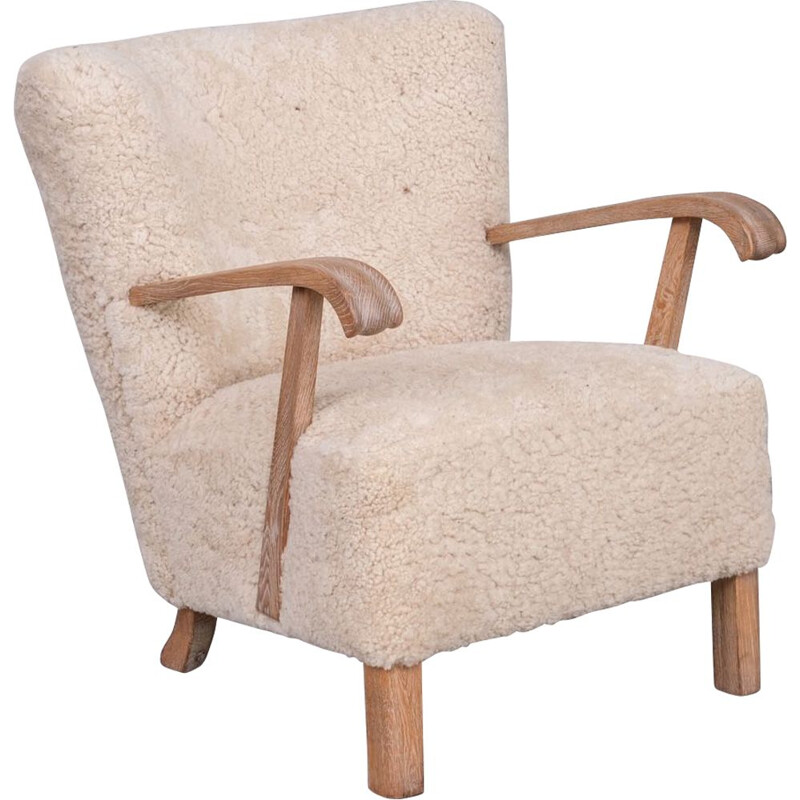 Pair of sheepskin swedish mid-century armchairs