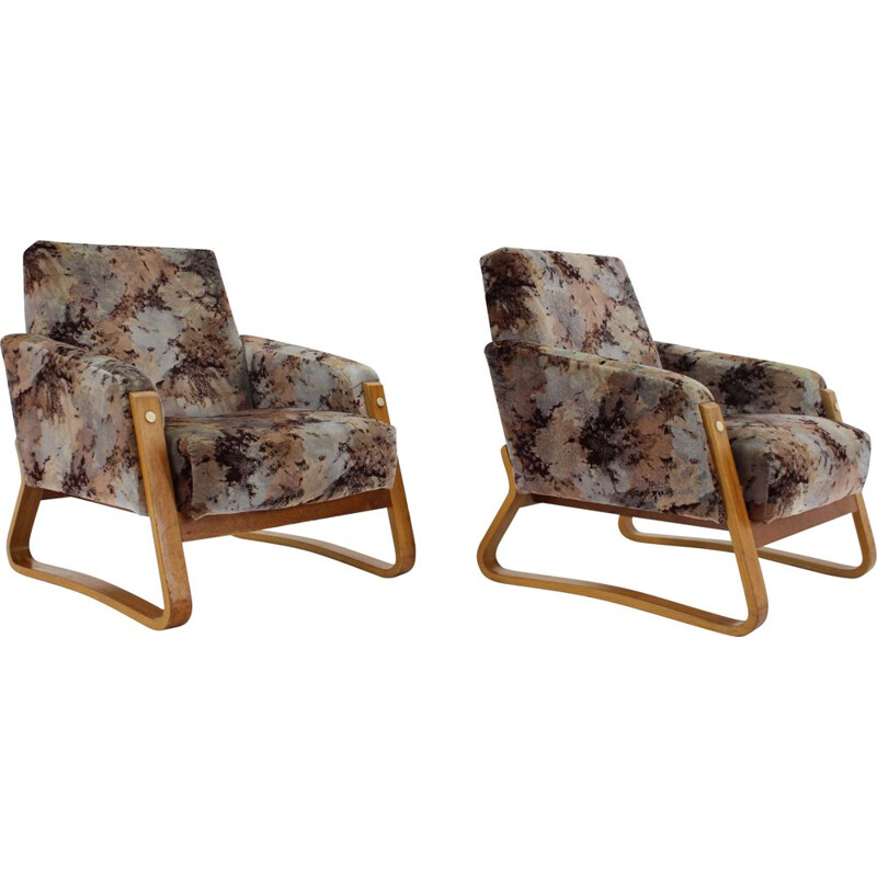 Pair of mid-century armchairs by Ludvik Volak for Drevopodnik Holesov, 1960s