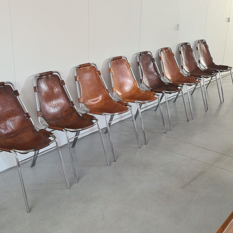 Set of 8 vintage leather dining chairs selected by Charlotte Perriand for Les Arcs, France 1960s