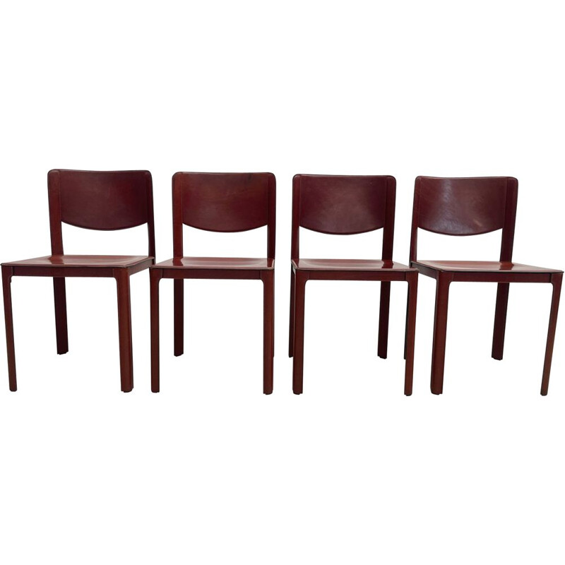 Set of 8 mid-century red leather dining chairs model "Sistina Saddle" by Tito Agnoli for Matteo Grassi, Italy 1980s