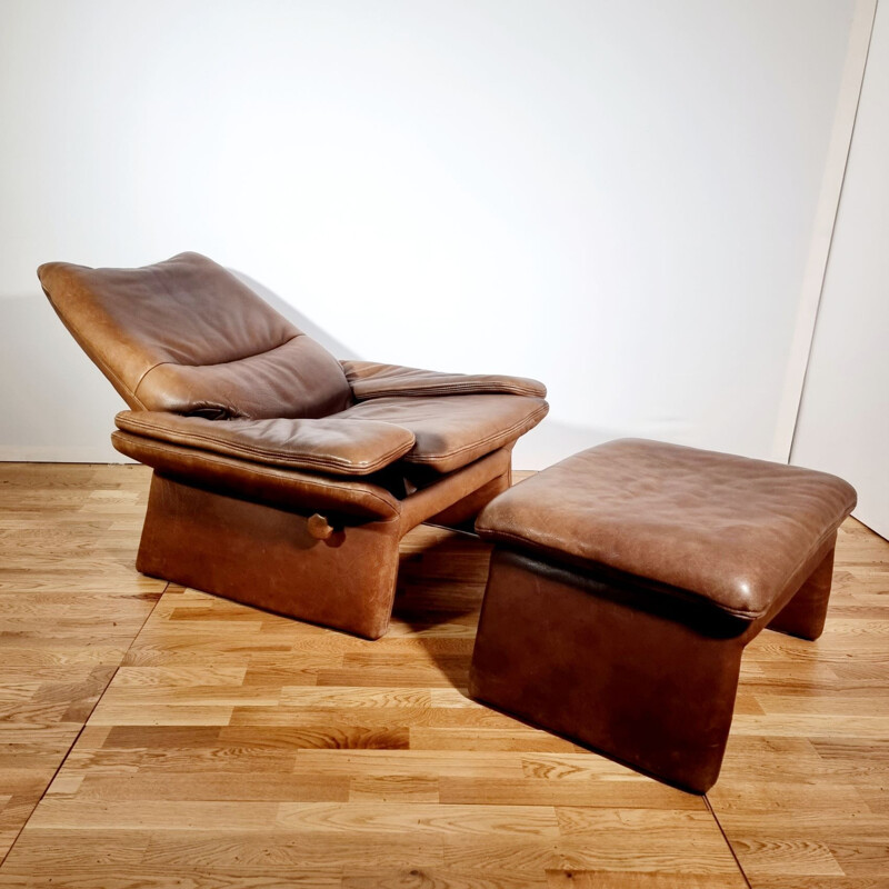 Vintage brown leather armchair and ottoman by Hans Kaufeld, 1970-1980