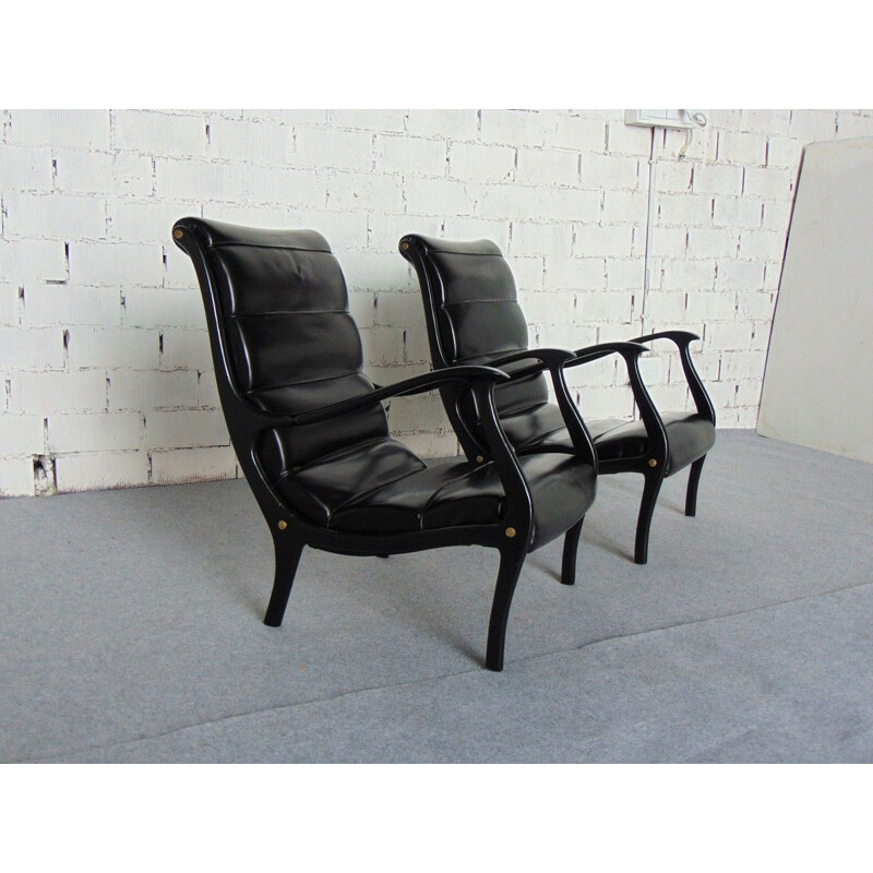 Paar vintage houten en kunstlederen fauteuils Mitzi van Ezio Longhi