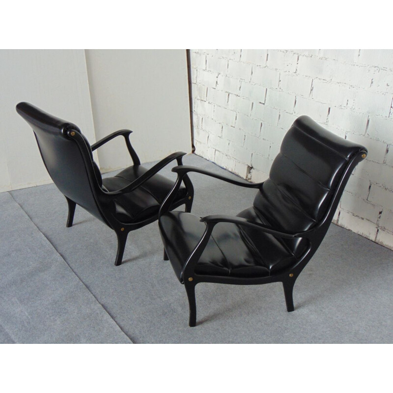 Paire de fauteuils vintage en bois et simili cuir modèle Mitzi par Ezio Longhi
