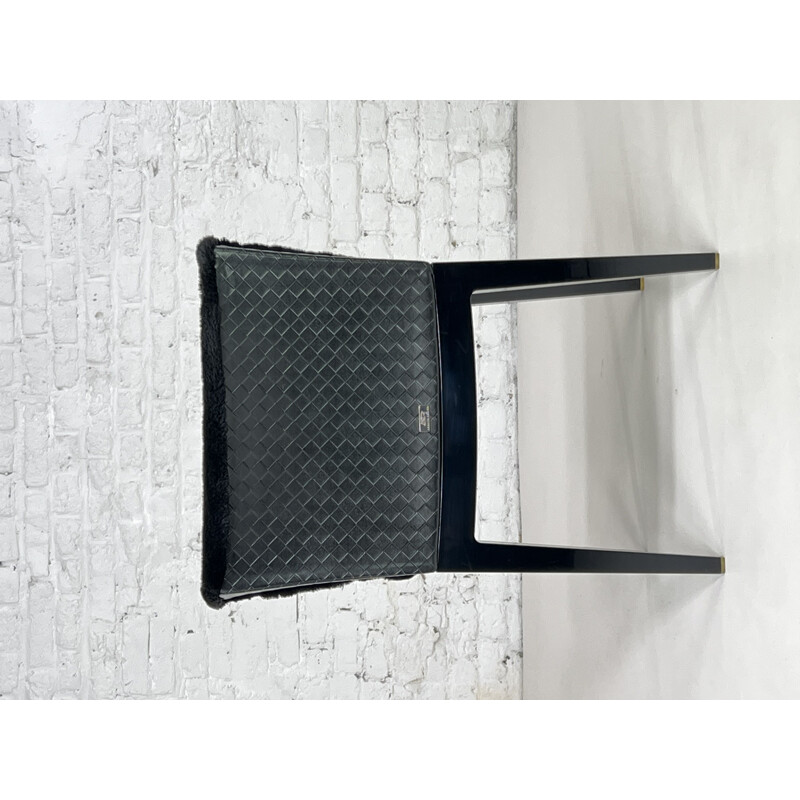 Pair of vintage black abs and black braided leather armchairs "Mademoiselle Kravitz" by Philippe Starck for Kartell