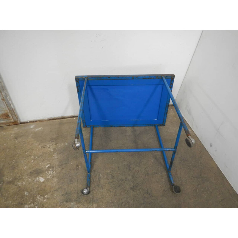 Vintage patchwork and blue colored iron trolley