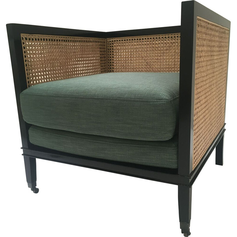 Armchair with vintage cushions in black lacquered wood, cane and brass