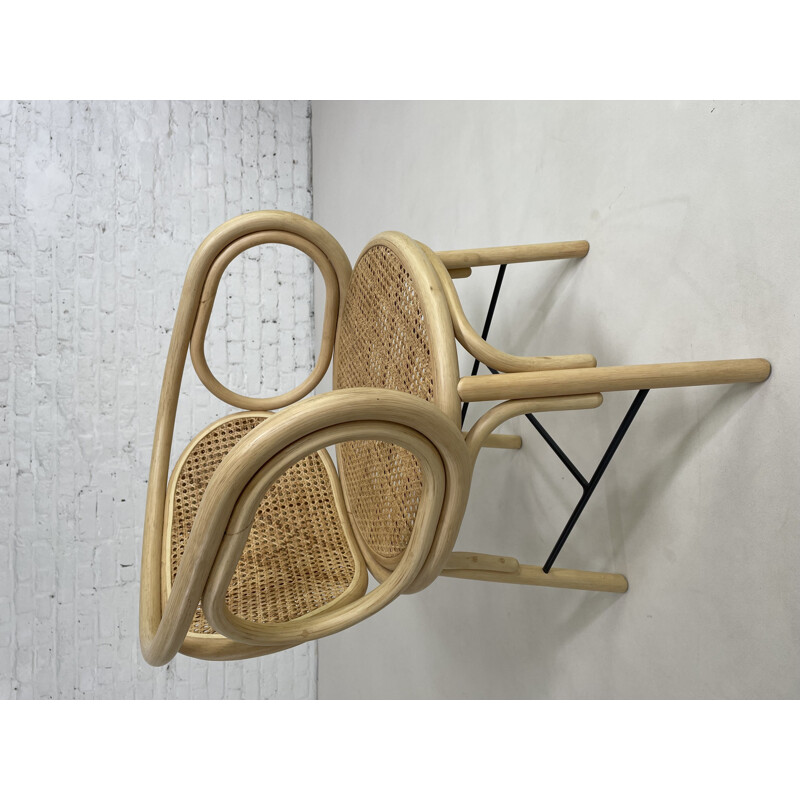 Vintage armchair in curved rattan, cane and metal