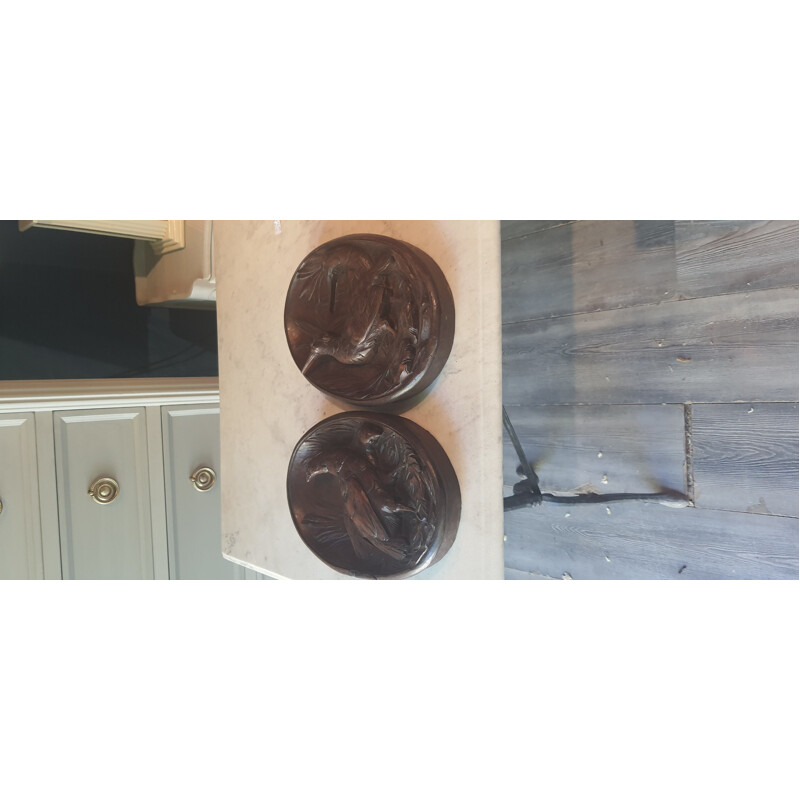 Pair of vintage animal medallions in solid walnut