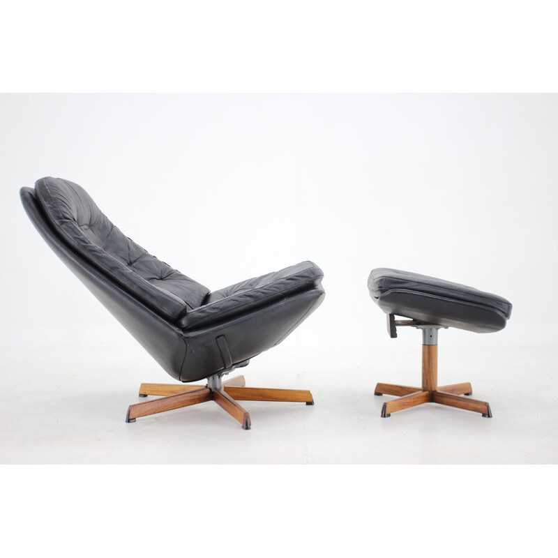 Vintage black leather recliner and footrest by Madsen and Schubell, Denmark 1960