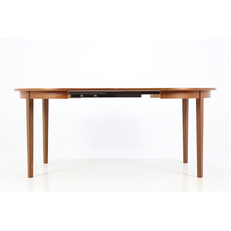 Scandinavian round extendable dining table in teak - 1960s