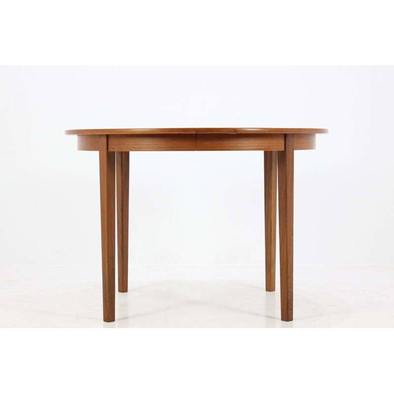 Scandinavian round extendable dining table in teak - 1960s