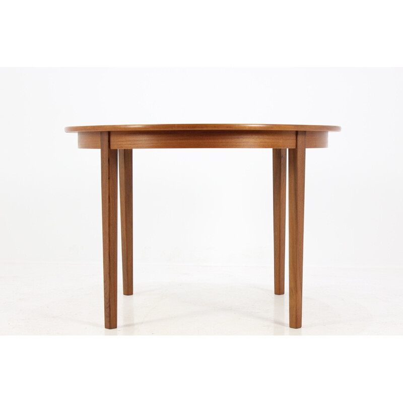 Scandinavian round extendable dining table in teak - 1960s