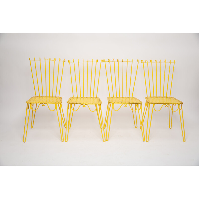 Set of 4 vintage yellow wrought iron chairs by Matthieu Mattegot