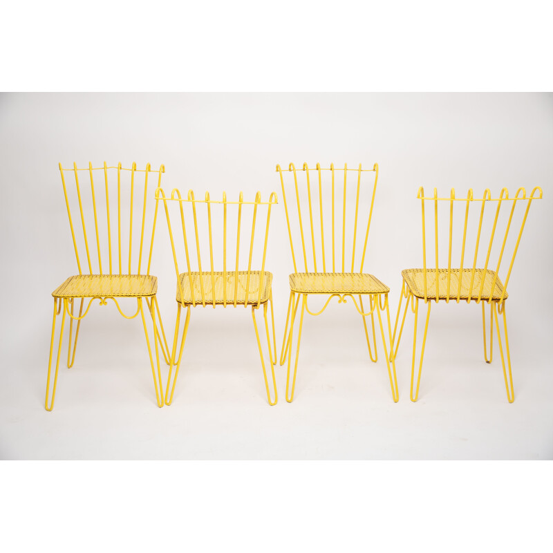 Set of 4 vintage yellow wrought iron chairs by Matthieu Mattegot