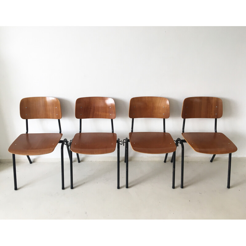 Set of 4 industrial Marko Holland chairs in wood and black metal - 1960s