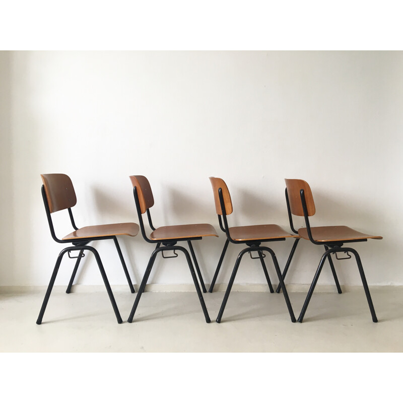 Set of 4 industrial Marko Holland chairs in wood and black metal - 1960s