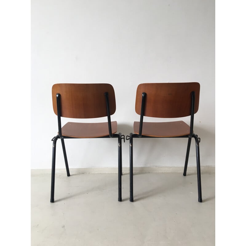 Set of 4 industrial Marko Holland chairs in wood and black metal - 1960s