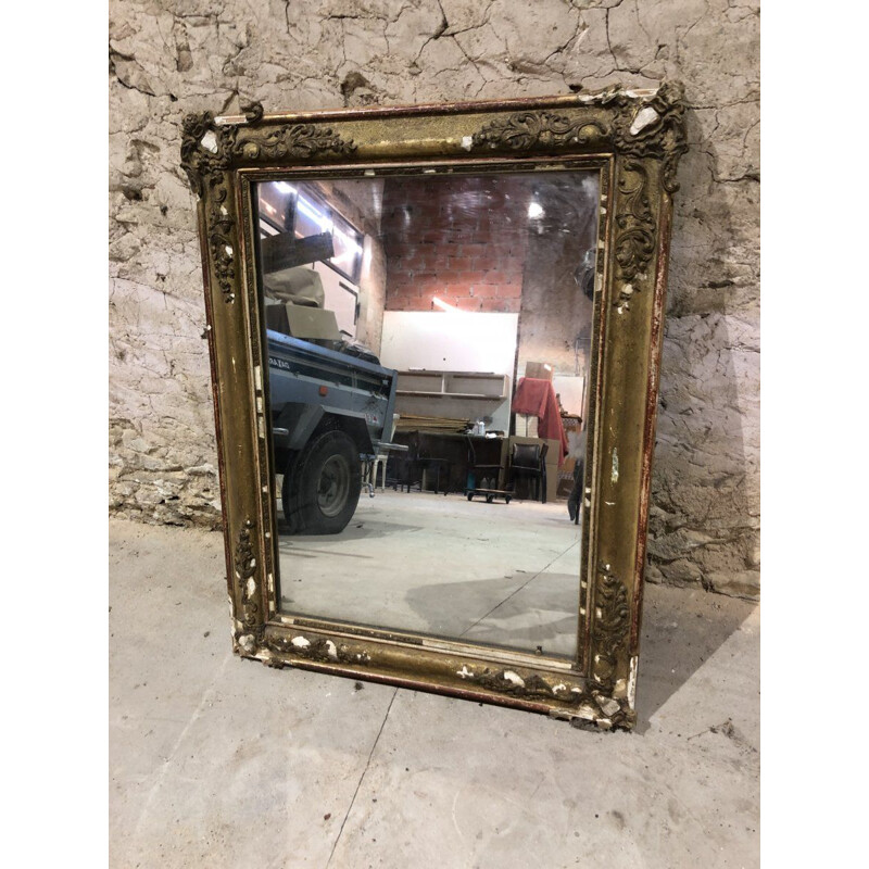 Miroir vintage en bois stucké doré