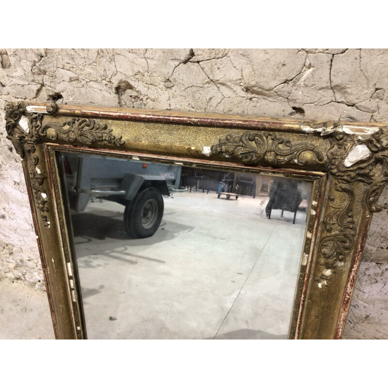 Miroir vintage en bois stucké doré