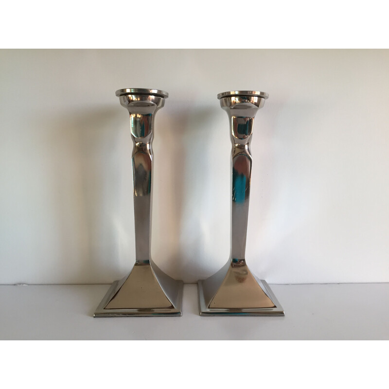 Pair of vintage cast aluminum candle holders