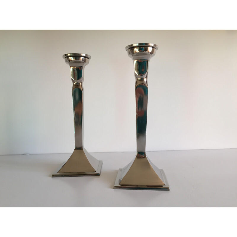 Pair of vintage cast aluminum candle holders