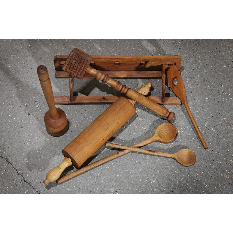 Vintage wooden kitchen utensils with rack