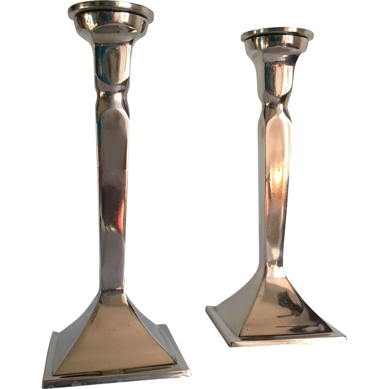 Pair of vintage cast aluminum candle holders