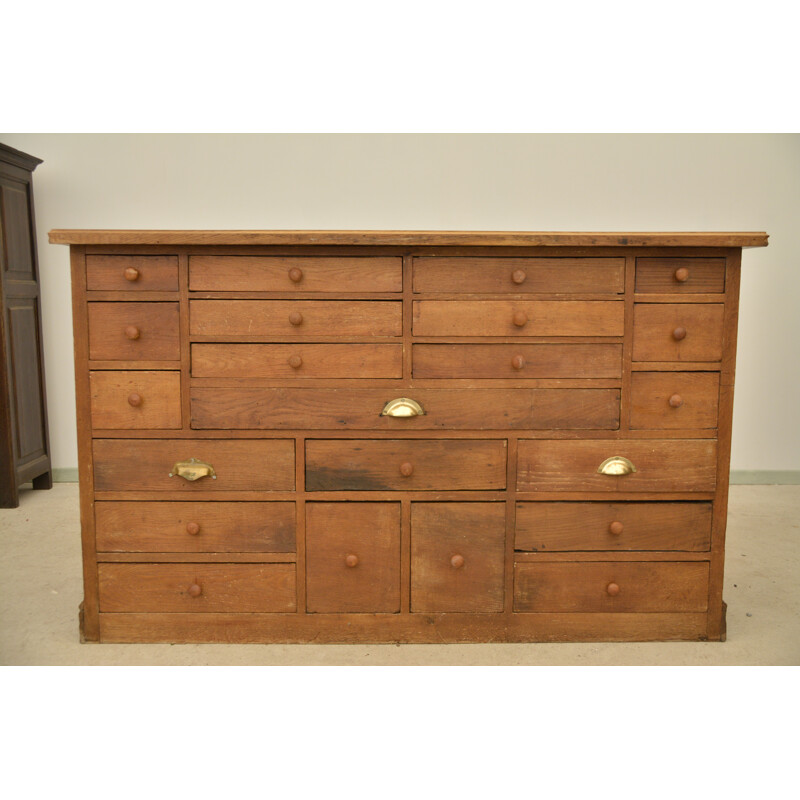 Vintage oakwood craft cabinet with 22 drawers of all sizes and shapes