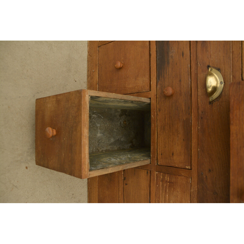 Vintage oakwood craft cabinet with 22 drawers of all sizes and shapes