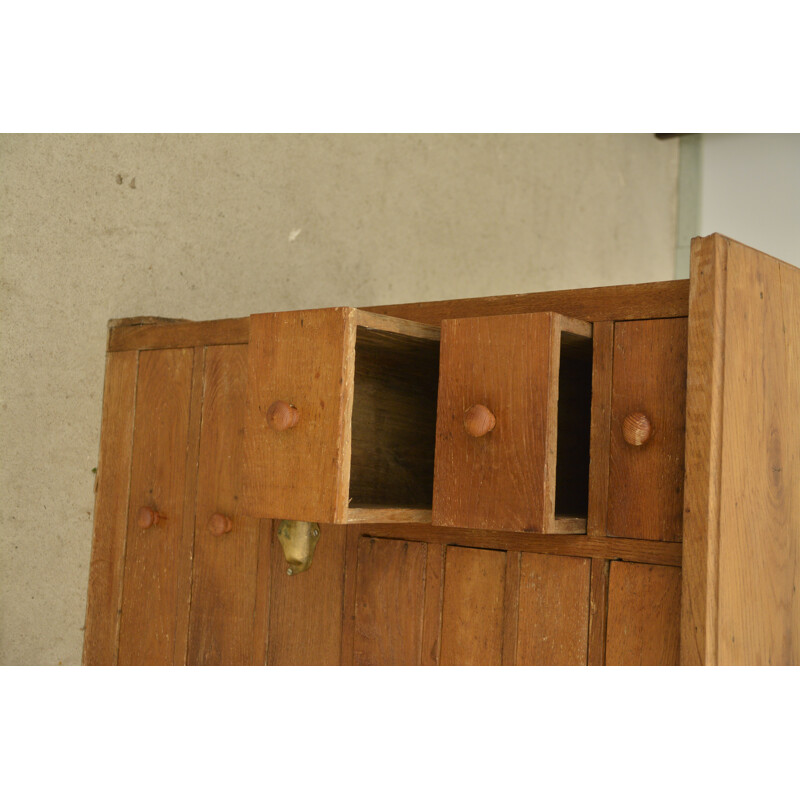 Vintage oakwood craft cabinet with 22 drawers of all sizes and shapes