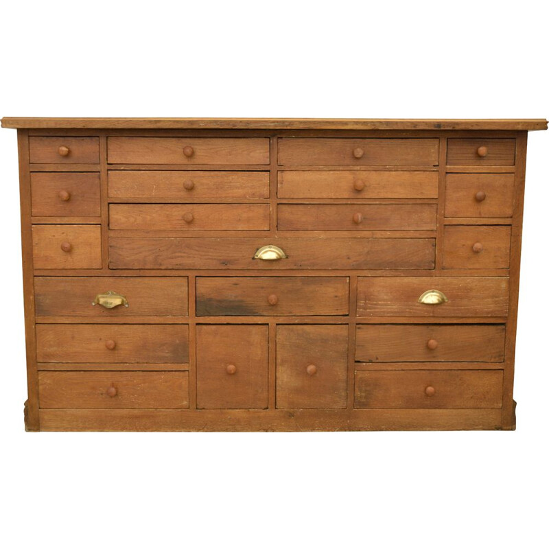 Vintage oakwood craft cabinet with 22 drawers of all sizes and shapes