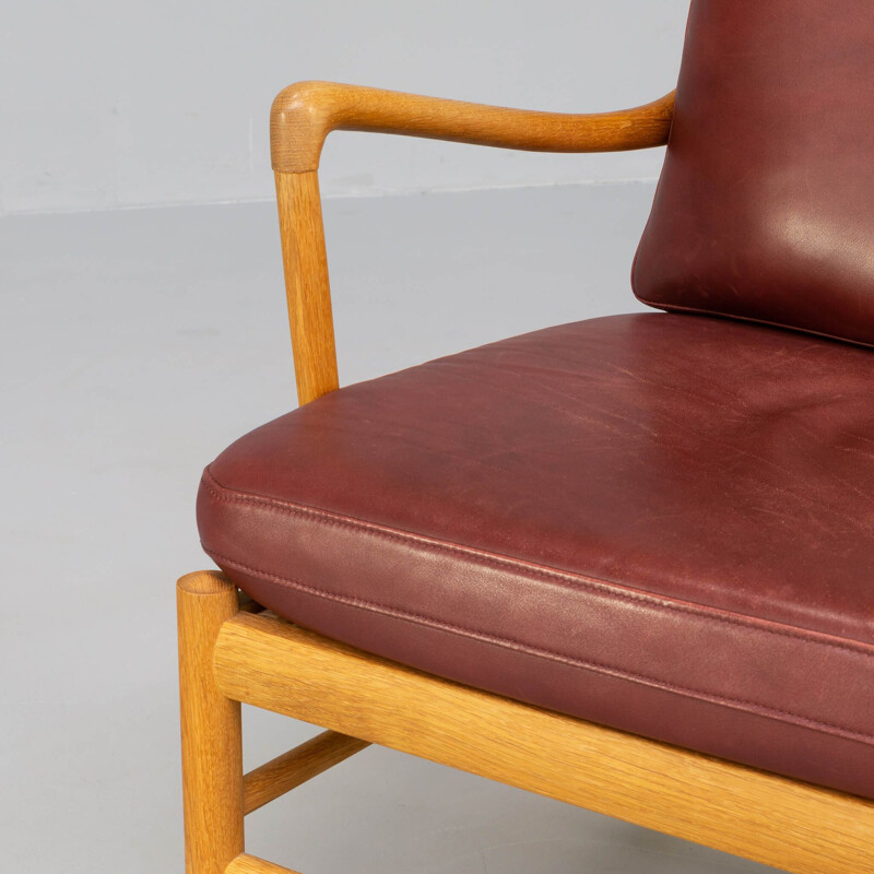 Vintage koloniale fauteuil en voetenbank "Ow149 en Ow149F" van Ole Wanscher voor Carl Hansen