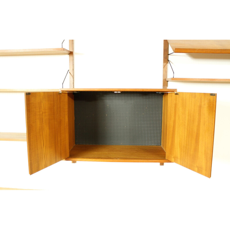 Mid century modular teak wall unit by Poul Cadovius, Denmark