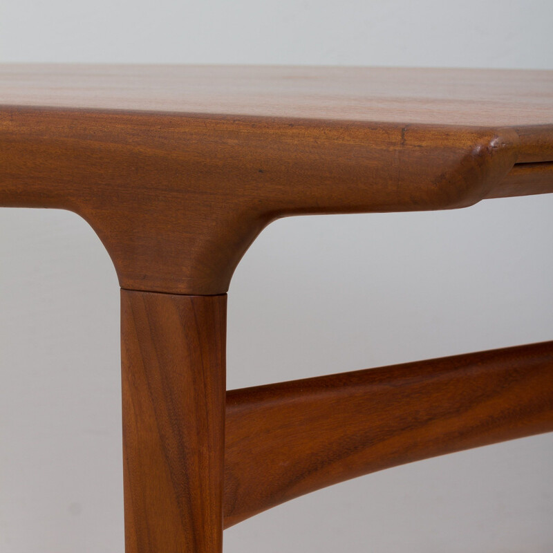 Vintage teak dining table with hidden extension by Johannes Andersen for Uldum, Denmark 1960s