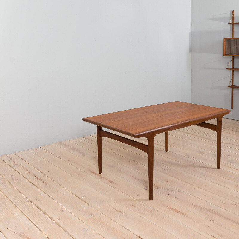 Vintage teak dining table with hidden extension by Johannes Andersen for Uldum, Denmark 1960s