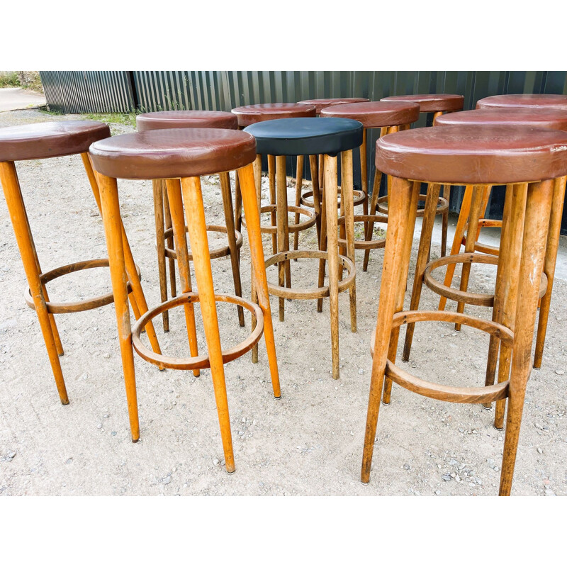 Set of 11 vintage Baumann wooden bar stools, 1970