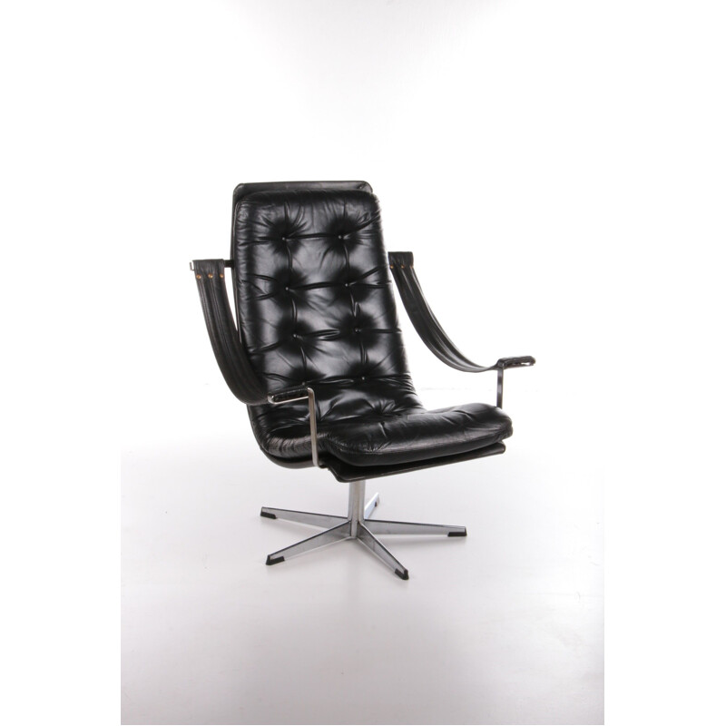 Vintage black cowhide leather swivel armchair by Geoffrey Harcourt for Artifort, 1960s