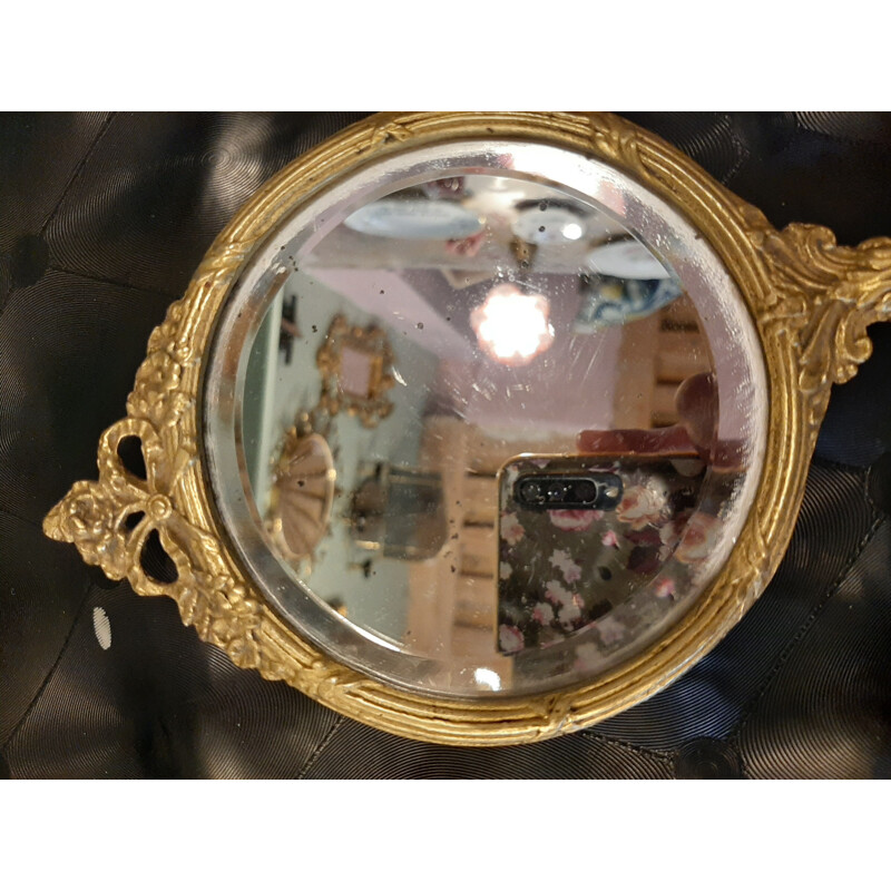 Vintage bronze hand mirror