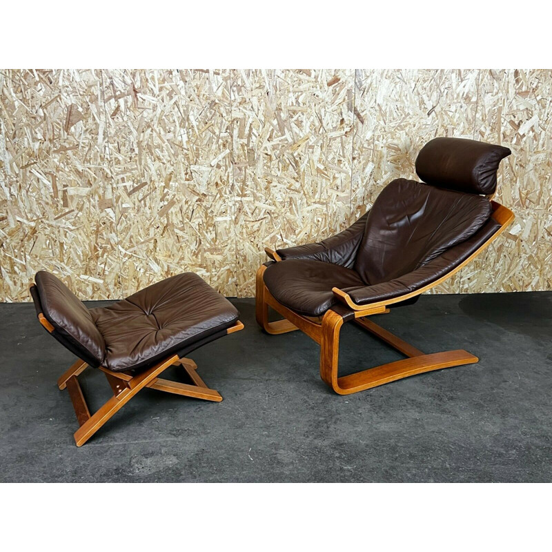 Sillón vintage de teca y cuero con otomana de Ake Fribytter Nelo, Suecia 1960-1970