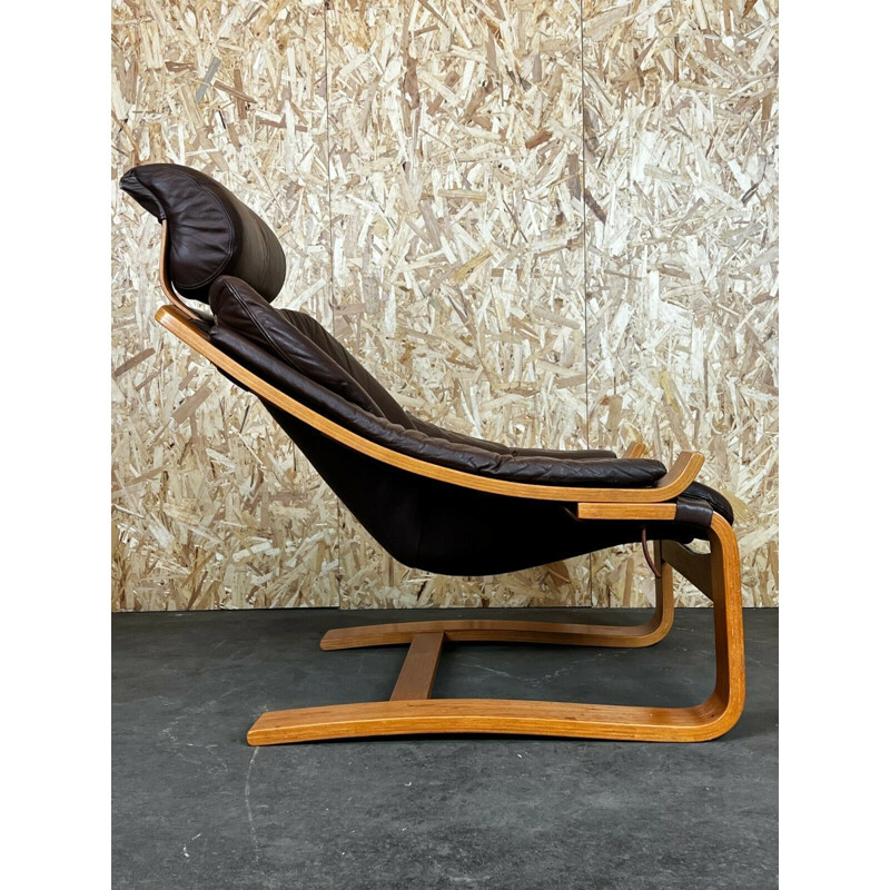 Vintage teak and leather armchair with ottoman by Ake Fribytter Nelo, Sweden 1960-1970