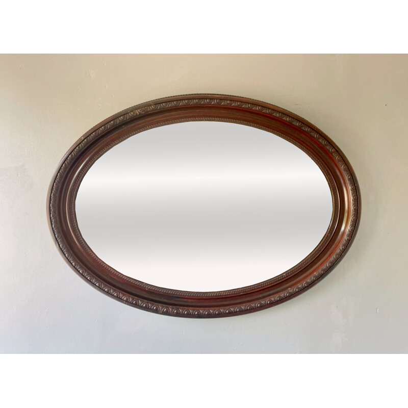 Vintage oval mirror with wooden frame