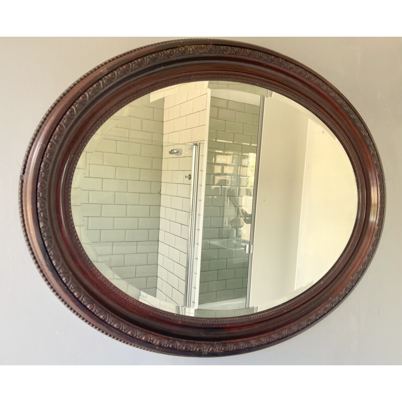 Vintage oval mirror with wooden frame
